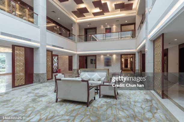 small waiting area in hotel lobby - small apartment building exterior stock pictures, royalty-free photos & images