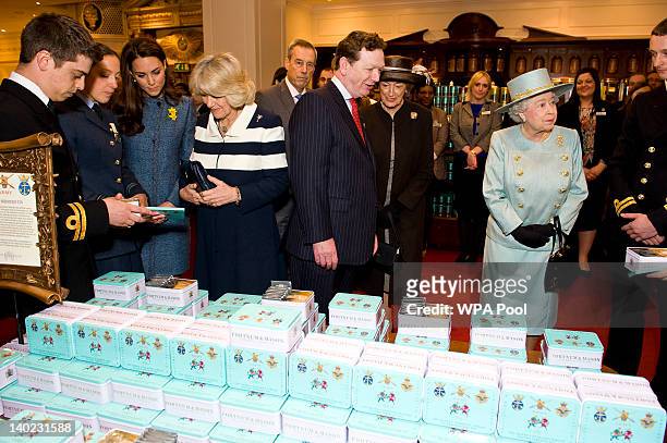 Camilla, Duchess of Cornwall and Catherine, Duchess Of Cambridge and Queen Elizabeth II visit Fortnum & Mason store on March 1, 2012 in London,...