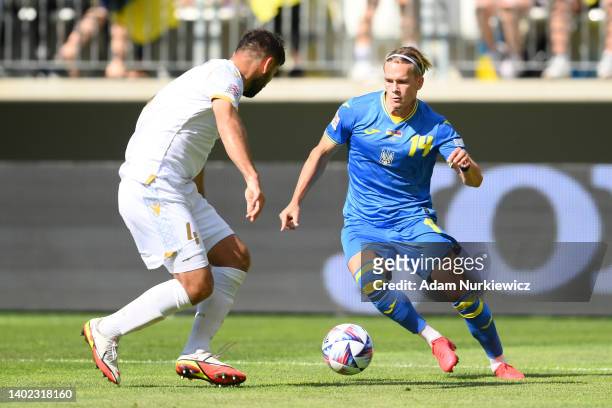 Mykhaylo Mudryk of Ukraine is challenged by Taron Voskanyan of Armenia during the UEFA Nations League League B Group 1 match between Ukraine and...