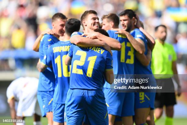 Oleksandr Karavayev of Ukraine celebrates with teammates after their sides victory during the UEFA Nations League League B Group 1 match between...