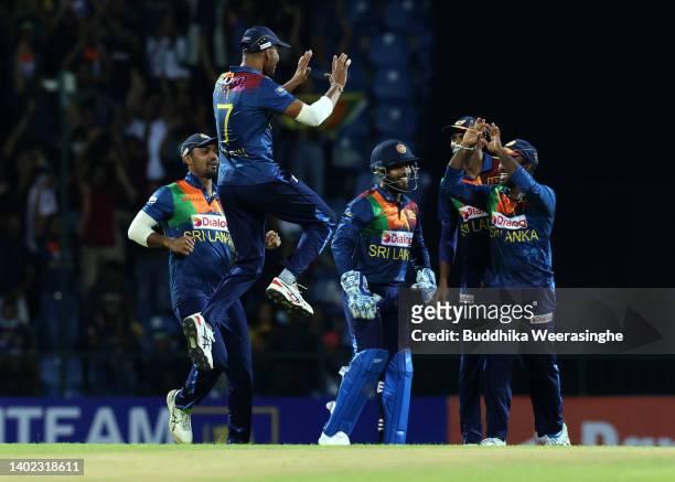 Dasun Shanaka of Sri Lanka celebrates with teammates after taking the wicket Josh Inglis of Australia during the 3rd match in the T20 International...