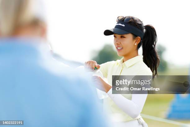 Muni He of China looks on before the start of the second round of the ShopRite Classic at Seaview Bay Course on June 11, 2022 in Galloway, New Jersey.