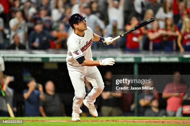 Luke Maile of the Cleveland Guardians hits a walk-off sacrifice fly during the ninth inning against the Oakland Athletics at Progressive Field on...