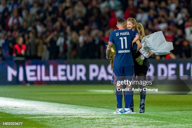 Angel Di Maria, his wife Jorgelina Cardoso and their children thank the fans after the Ligue 1 Uber Eats match between Paris Saint Germain and FC...