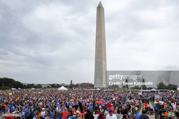 Demonstrators attend a March for Our Lives rally against gun violence at the base of the Washington Monument on the National Mall June 11, 2022 in...
