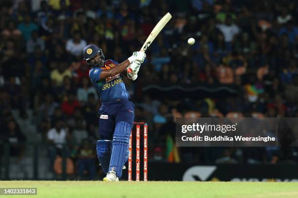 Chamika Karunaratne of Sri Lanka hits to the boundary during the 3rd match in the T20 International series between Sri Lanka and Australia at...