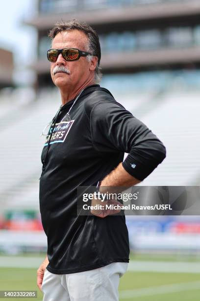Head coach Jeff Fisher of the Michigan Panthers looks on during warm ups before the game against the New Jersey Generals at Protective Stadium on...
