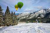 winter landscape, hot air balloons, resort Jasna, Tatras, Slovakia.