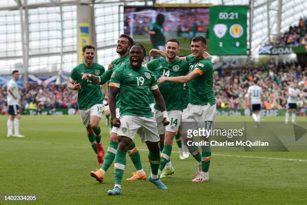 Michael Obafemi of Republic of Ireland celebrates after scoring their side's third goal with team mates during the UEFA Nations League League B Group...