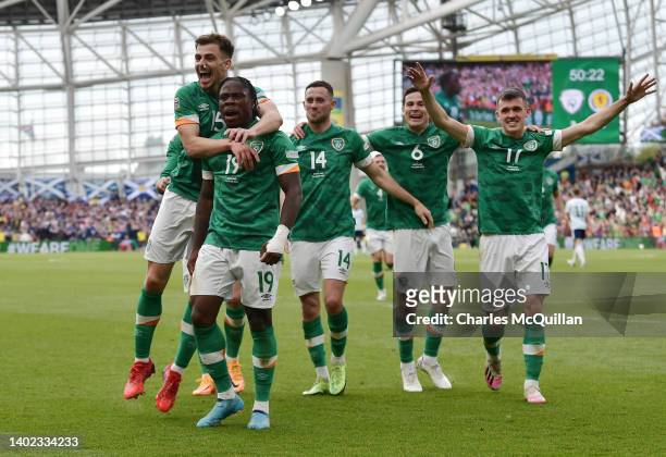 Michael Obafemi of Republic of Ireland celebrates after scoring their side's third goal with team mates during the UEFA Nations League League B Group...