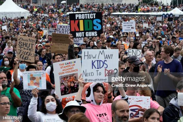 Demonstrators attend a March for Our Lives rally against gun violence on the National Mall June 11, 2022 in Washington, DC. The March For Our Lives...