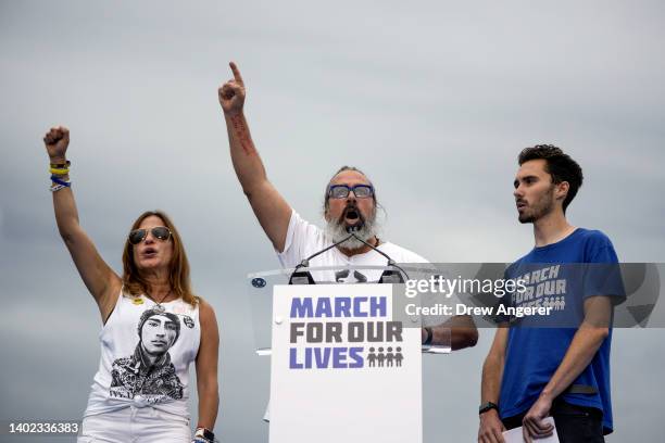 Manuel and Patricia Oliver, parents of Parkland shooting victim Joaquin Oliver, and gun control activist David Hogg speak during a March for Our...