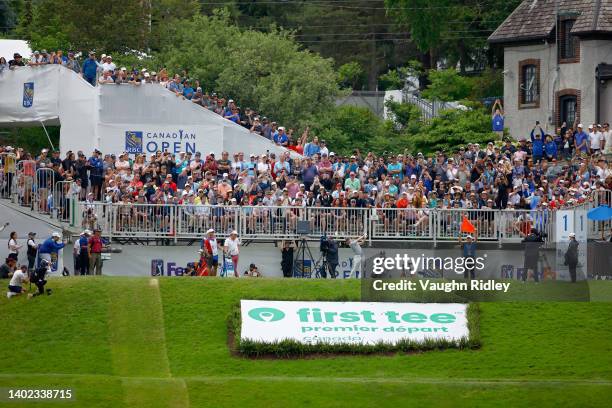 Rory McIlroy of Northern Ireland plays his shot from the first tee during the third round of the RBC Canadian Open at St. George's Golf and Country...