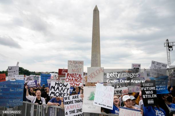 Demonstrators attend a March for Our Lives rally against gun violence on the National Mall June 11, 2022 in Washington, DC. The March For Our Lives...