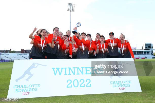 Georgia Adams of Southern Vipers lifts the Charlotte Edwards Cup trophy following their side's victory in the Charlotte Edwards Cup Final between...