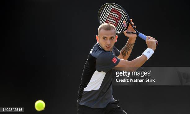 Dan Evans of Great Britain plays against Jack Sock of United States during day eight of the Rothesay Open at Nottingham Tennis Centre on June 11,...