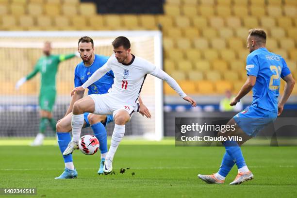 Mason Mount of England is challenged by itaduring the UEFA Nations League - League A Group 3 match between England and Italy at Molineux on June 11,...