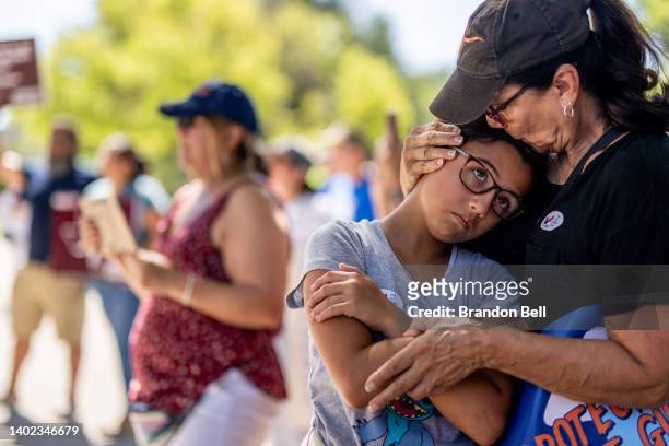 Linda Hello comforts her granddaughter Eisley Miller during a March for Our Lives rally at the Texas state Capitol on June 11, 2022 in Austin, Texas....