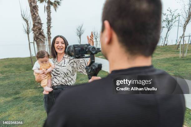 Family Using Filming Camera Family Filming Video Photos and Premium High Res Pictures - Getty Images