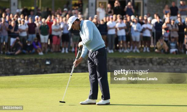 Charl Schwartzel of South Africa makes the winning putt as he wins the LIV Golf Invitational at The Centurion Club on June 11, 2022 in St Albans,...