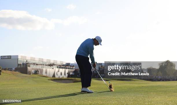 Charl Schwartzel of South Africa plays his third shot from the 18th fairway during the LIV Golf Invitational at The Centurion Club on June 11, 2022...