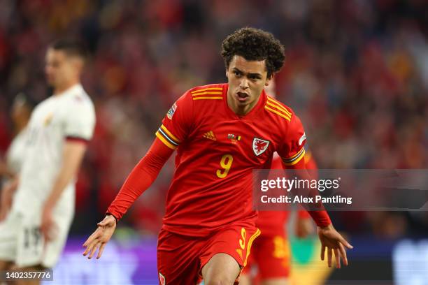 Brennan Johnson of Wales celebrates after scoring their team's first goal during the UEFA Nations League League A Group 4 match between Wales and...