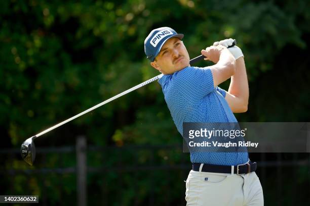 Austin Cook of the United States plays his shot from the 17th tee during the third round of the RBC Canadian Open at St. George's Golf and Country...