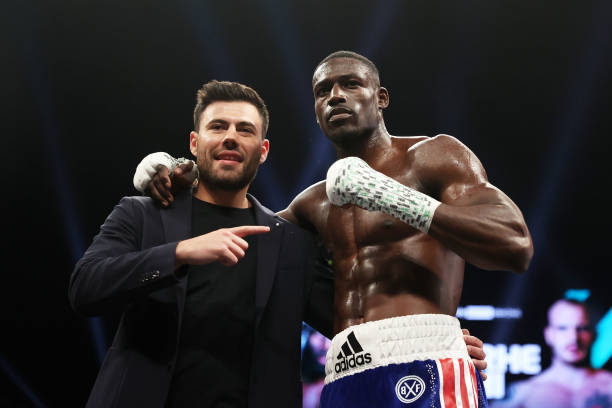 Richard Riakporhe celebrates with Ben Shalom, BOXXER CEO after victory in the Cruiserweight fight between Richard Riakporhe and Fabio Turchi as part...