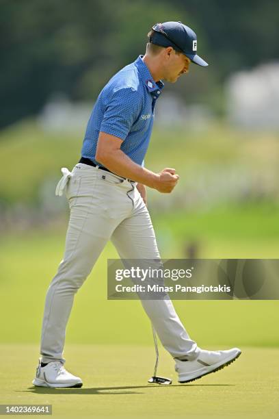 Austin Cook of the United States reacts after making birdie on the 11th green during the third round of the RBC Canadian Open at St. George's Golf...