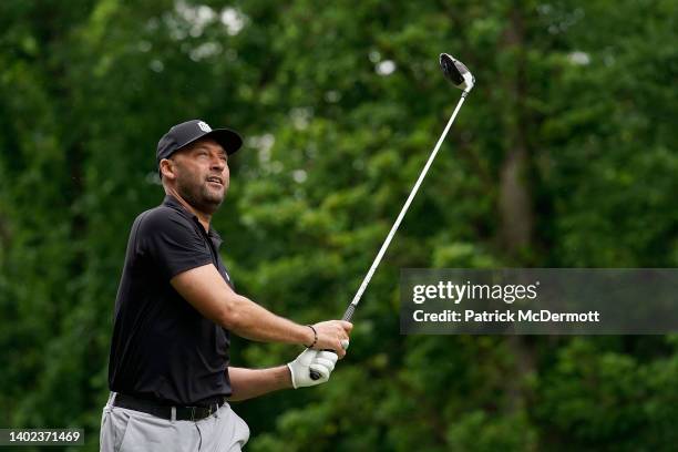 Former Major League Baseball player Derek Jeter hits his tee shot on the 10th hole during the Celebrity Foursome at the second round of the American...