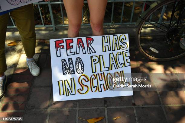 Protester holds a sign during March For Our Lives II to protest against gun violence on June 11, 2022 in Los Angeles, California. Gun reform...