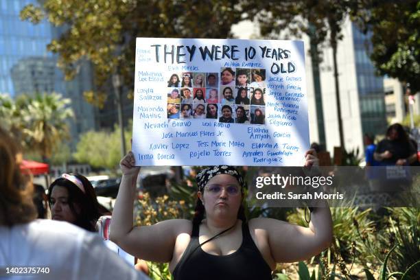 Protester holds a sign during March For Our Lives II to protest against gun violence on June 11, 2022 in Los Angeles, California. Gun reform...