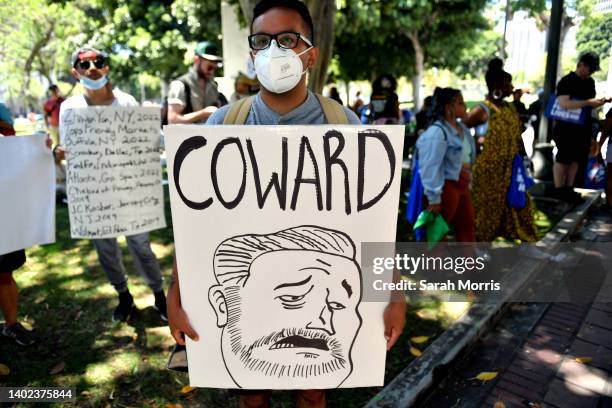 Protester holds a sign during March For Our Lives II to protest against gun violence on June 11, 2022 in Los Angeles, California. Gun reform...