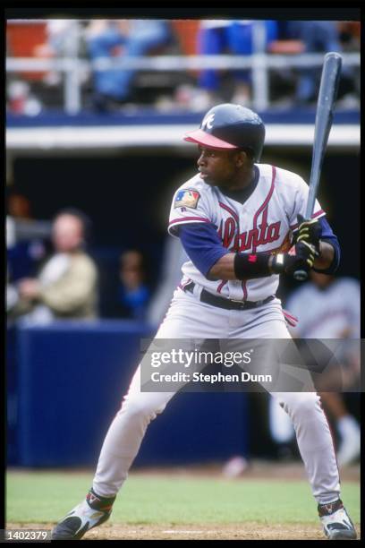 Outfielder Deion Sanders of the Atlanta Braves takes his turn at bat during a game against the San Diego Padres at Jack Murphy Stadium in San Diego,...