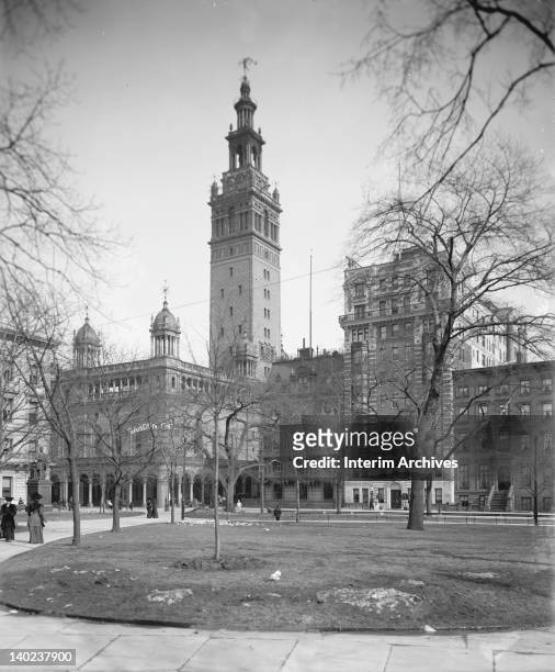 Exterior view of Madison Square Garden, on the corner of 26th and Madison Avenue in New York City, as seen from Madison Square Park, circa 1900. It...