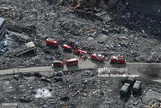 aerial view of the japanese ground self-defense force and disaster relief crews - humanitarian aid stock-fotos und bilder