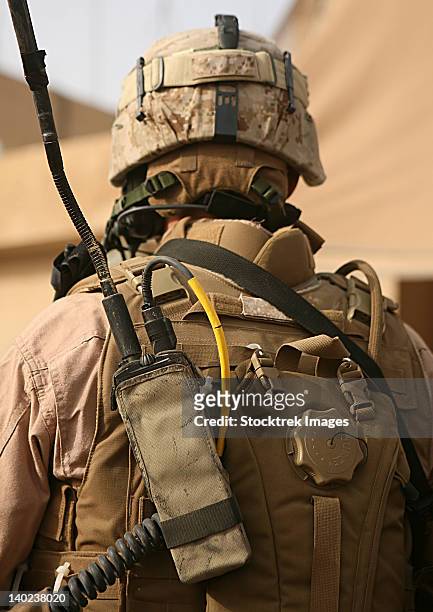 a vehicle commander with his radio equipment attached to his vest. - military rucksack stock pictures, royalty-free photos & images