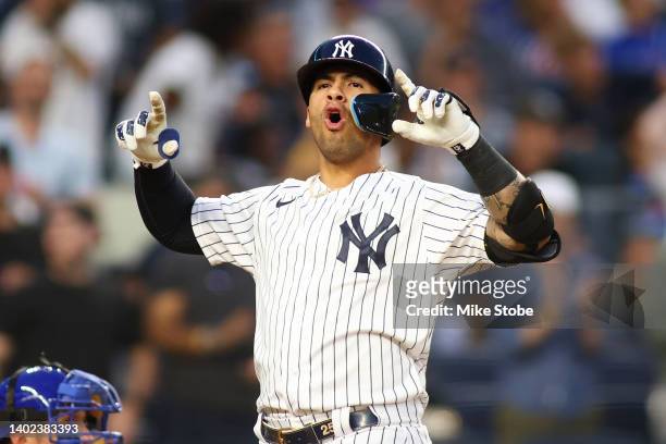 Gleyber Torres of the New York Yankees reacts after hitting a fourth inning home run against the Chicago Cubs at Yankee Stadium on June 11, 2022 in...