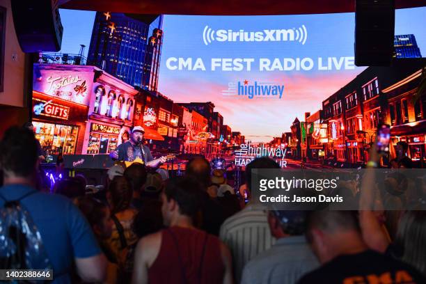 Mitchell Tenpenny performs onstage during SiriusXM's The Music Row Happy Hour Live On The Highway From Margaritaville on June 11, 2022 in Nashville,...