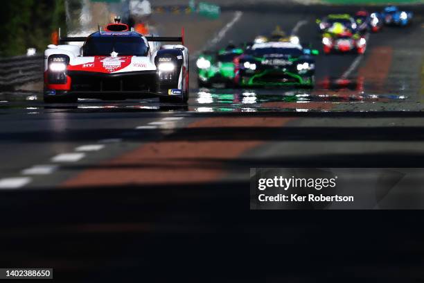 The Toyota Gazoo Racing GR010 Hybrid of Sebastien Buemi, Brendon Hartley and Ryo Hirakawa drives during the Le Mans 24 Hours Race at the Circuit de...