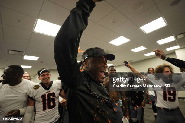 Head coach Kevin Sumlin of the Houston Gamblers celebrates with players in the locker room after defeating the Birmingham Stallions 17-15 at...