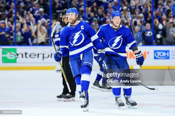 Steven Stamkos of the Tampa Bay Lightning celebrates with teammate Ondrej Palat after scoring a goal on Igor Shesterkin of the New York Rangers...