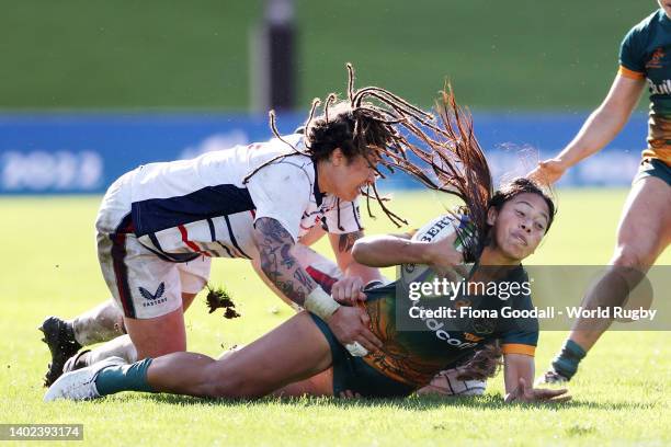 Cecilia Smith of Australia is tackled by Katana Howard of USA during the 2022 Pacific Four Series match between USA and the Australia Wallaroos at...