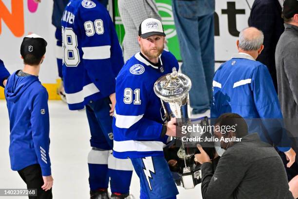 Steven Stamkos of the Tampa Bay Lightning skates with the Eastern Conference Prince of Wales Trophy after defeating the New York Rangers with a score...