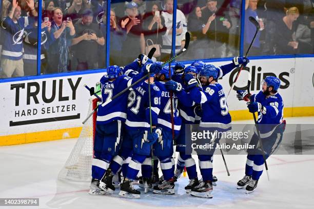 The Tampa Bay Lightning celebrate after defeating the New York Rangers with a score of 2 to 1 in Game Six of the Eastern Conference Final of the 2022...