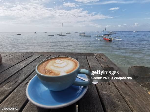 coffee latte by the beach - sanur stock pictures, royalty-free photos & images