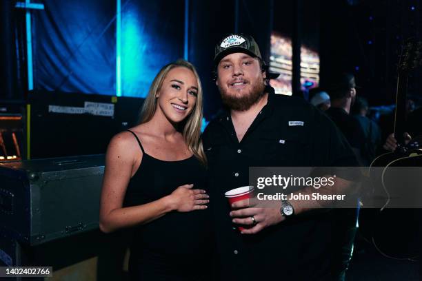 Nicole Hocking and Luke Combs attend day 3 of The 49th CMA Fest at Nissan Stadium on June 11, 2022 in Nashville, Tennessee.