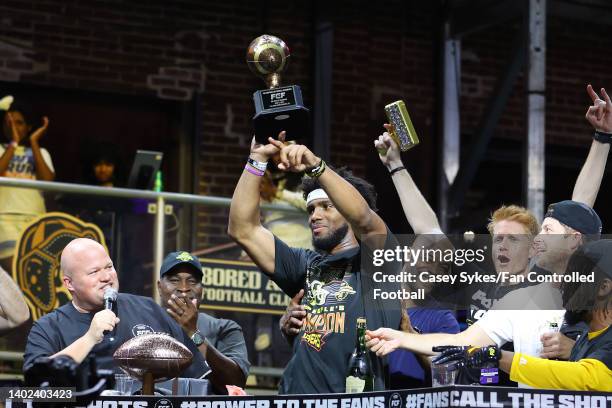 Kelly Bryant of Zappers holds up the MVP trophy after defeating the Bored Ape FC 42-24 during the Fan Controlled Football Season v2.0 - Championship...