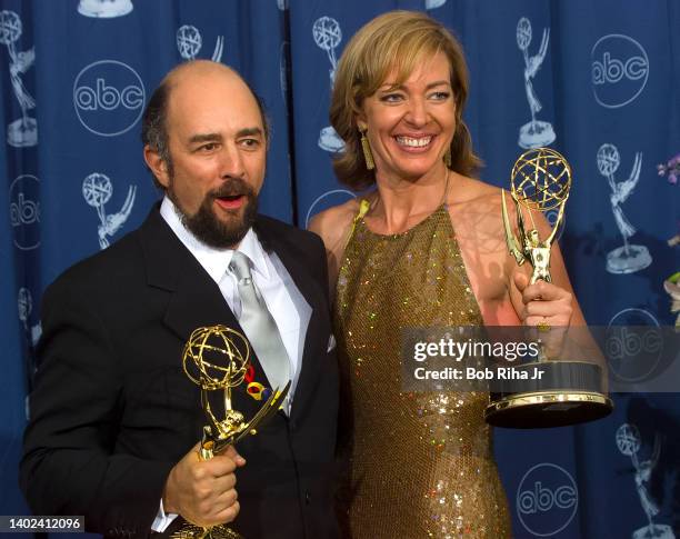 Emmy Winners Richard Schiff and Allison Janney backstage at the 52nd Emmy Awards Show at the Shrine Auditorium, September 10, 2000 in Los Angeles,...