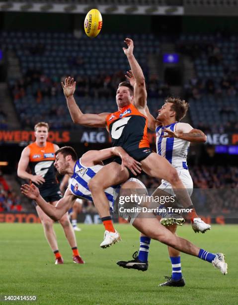 Jesse Hogan of the Giants attempts to mark the ball during the round 13 AFL match between the North Melbourne Kangaroos and the Greater Western...